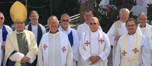 Bishop Michael Lewis, Andrew Mayes with supporting clergy and lay readers