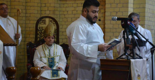 The Bishop presiding over the service as the scriptures are read
