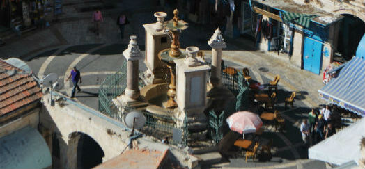 An ornate fountain in a Jerusalem courtyard