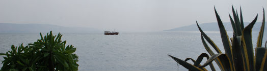 A boat sailing across the Sea of Galilee