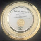 The award, a gold coloured engraved plate