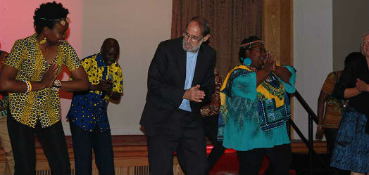 Chris Butt dancing with the Kenyan dance group
