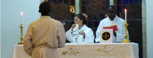Shu Peijin leading the eucharist