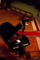 Looking down on the piano and violinist