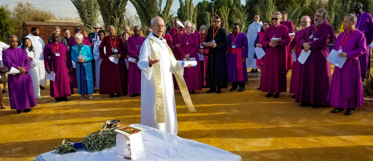 Archbishop Justin Welby leading communion outside
