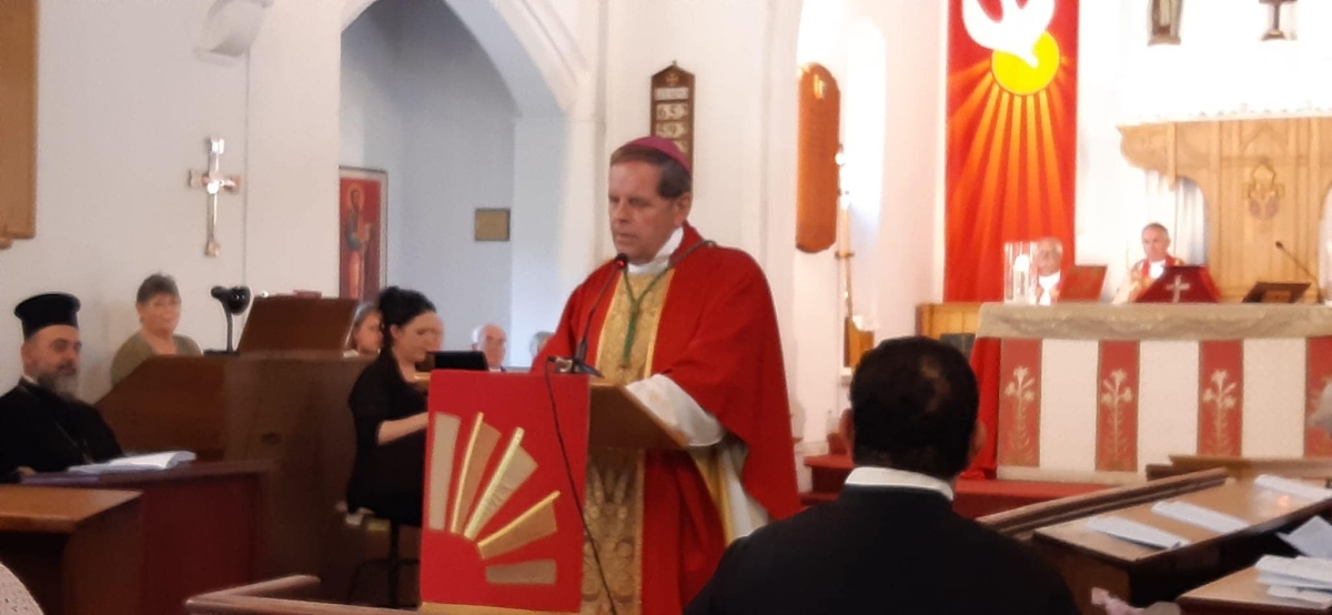 Bishop Michael delivering his speech at the front of the cathedral