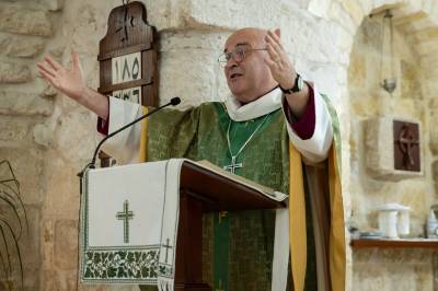 The Archbishop preaching at Ramallah