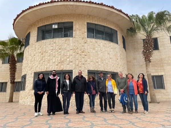The volunteers outside the Latin Patriarchate High School