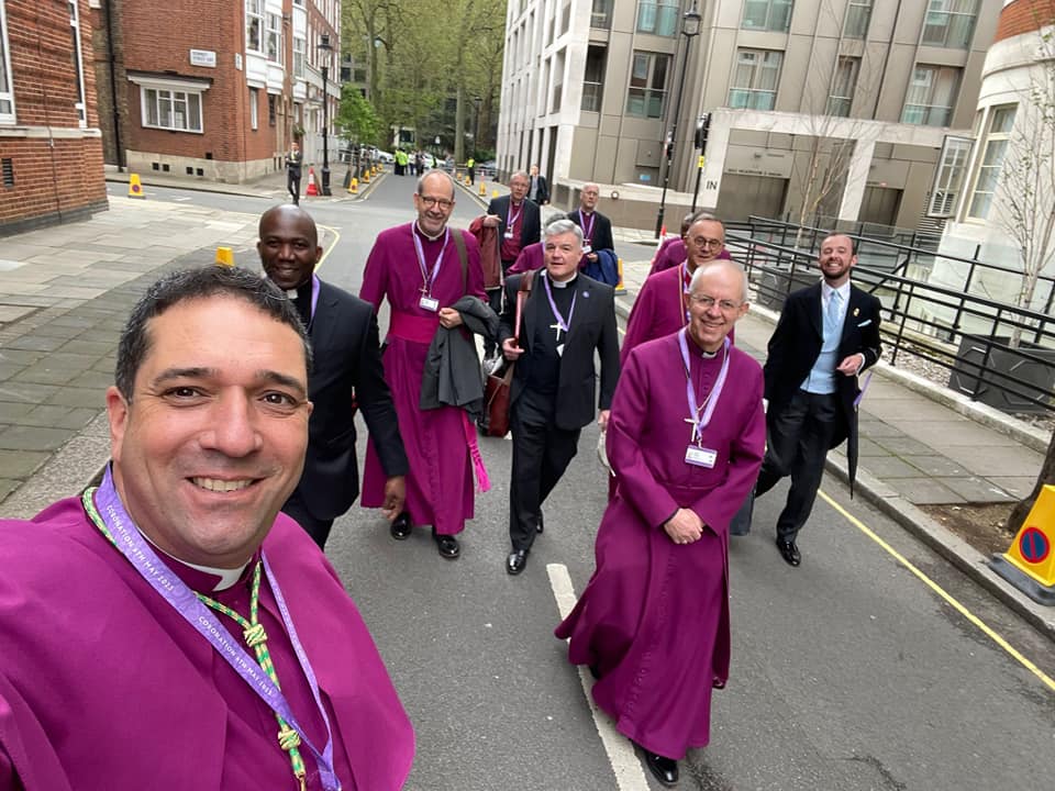 Selfie taken by Archbishop Hosam walking with Archbishop Justin Welby and other clergy