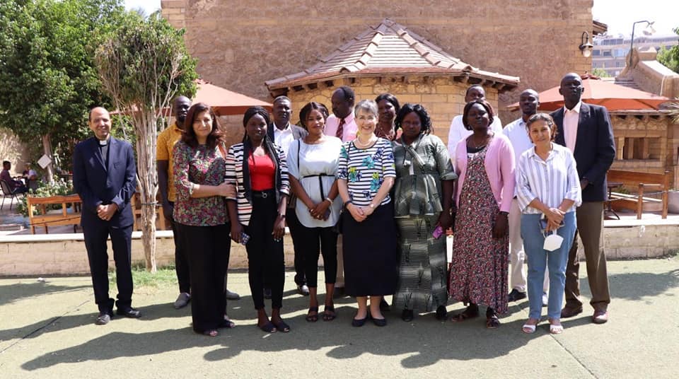 Caroline Welby with the students and Madeleine Sostanis, wife of Archbishop Samy Fawzy, and Archdeacon Emad Basilios Pastor of St. Michael and All Angels