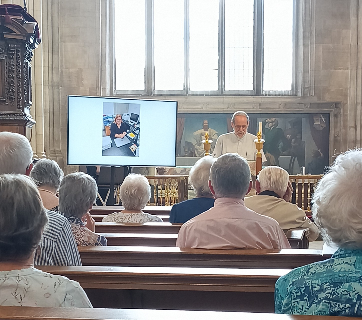 Canon Chris addresses the meeting
