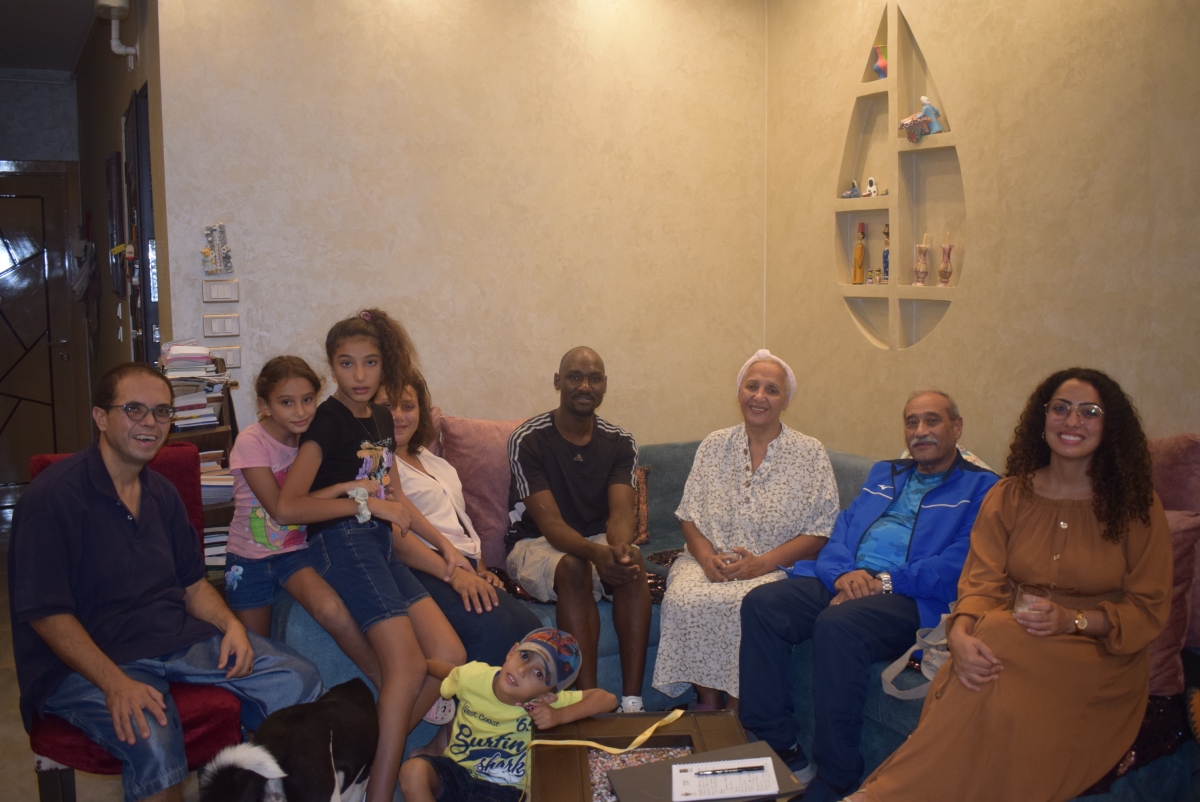 The group begins to gather for the weekly meeting