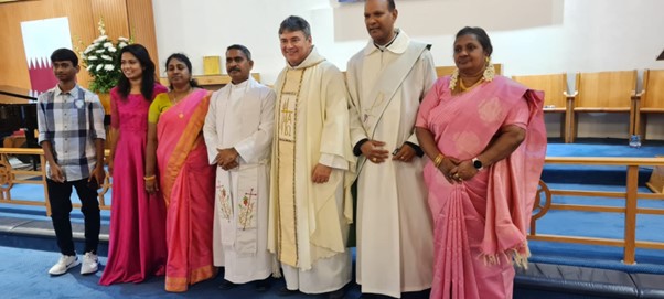 The ministry team 4 men and 3 women stand at the front of the church