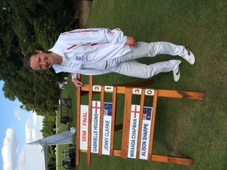 Gabrielle's name on the leader board in a croquet competition