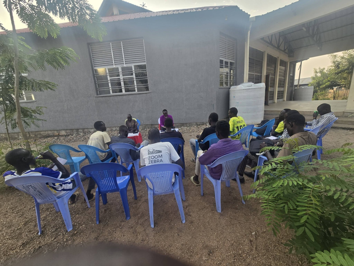 A group in the grounds of the Good Shepherd cathedral.