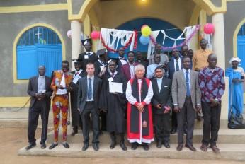 Graduates and staff outside St Luke's Church