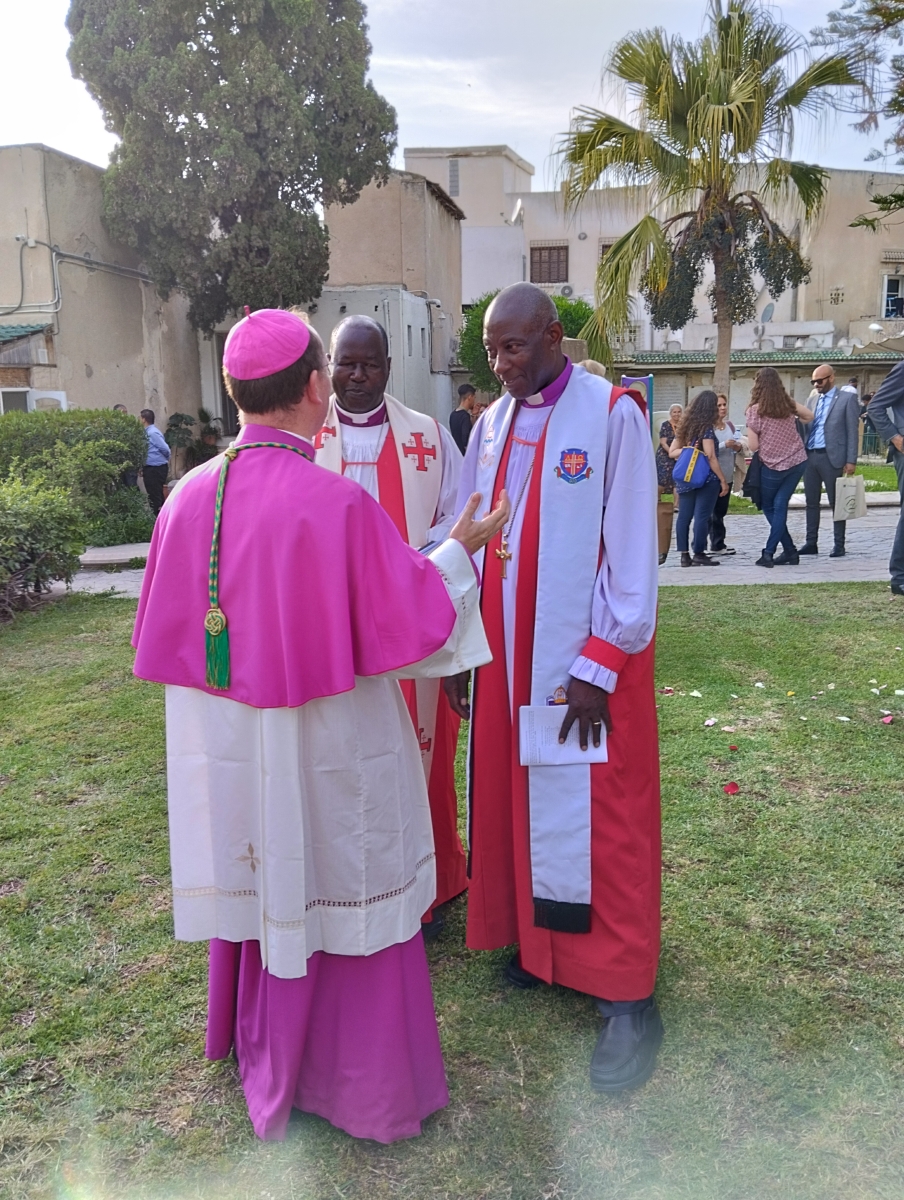 Ecumenical and International guests converse