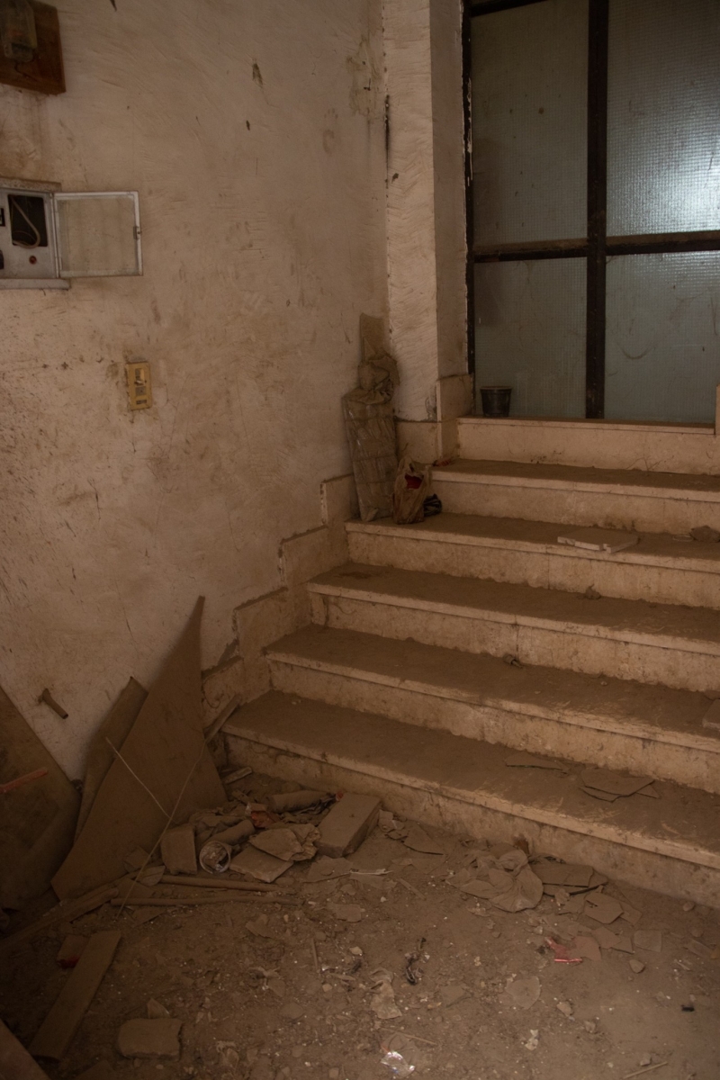 steps inside the building in a dangerous codition