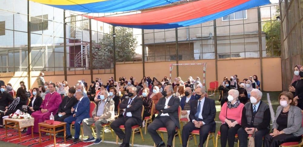The Archbishop, his wife, general director of the school and all other guests sitting during the outdoor assembly