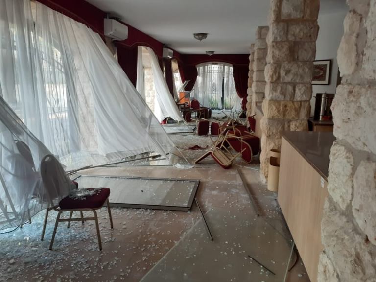 Blown in windows on ground floor of All Saints Church