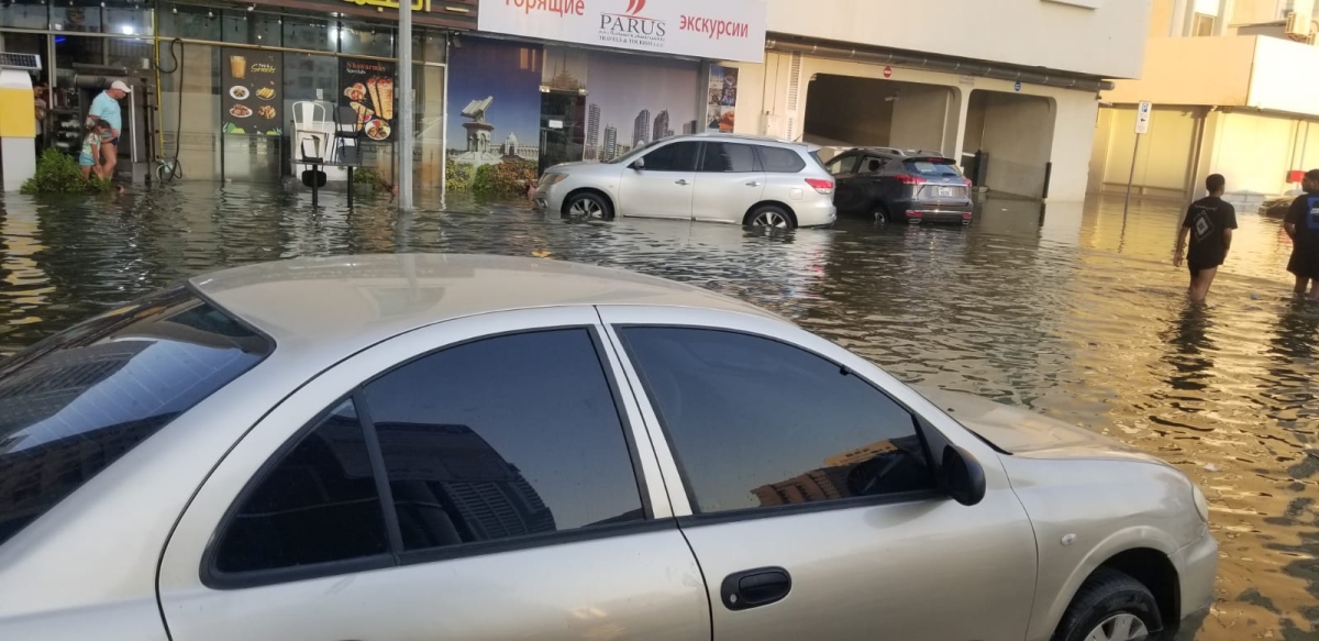 stranded vehicles in floods in Sharjah
